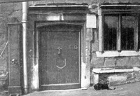 The 17th century alms or 'bread door' formerly at The Limes, Melton. In times of plague, food was passed through the aperture.